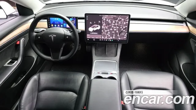 Tesla Model 3 — Фото автомобиля 7