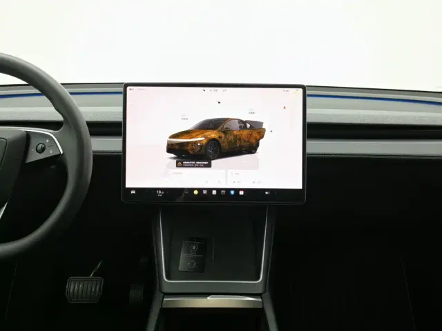 Tesla Model Y — Фото автомобиля 12