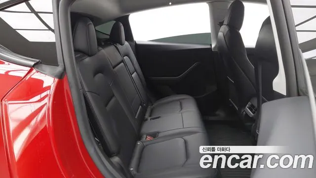 Tesla Model Y — Фото автомобиля 14