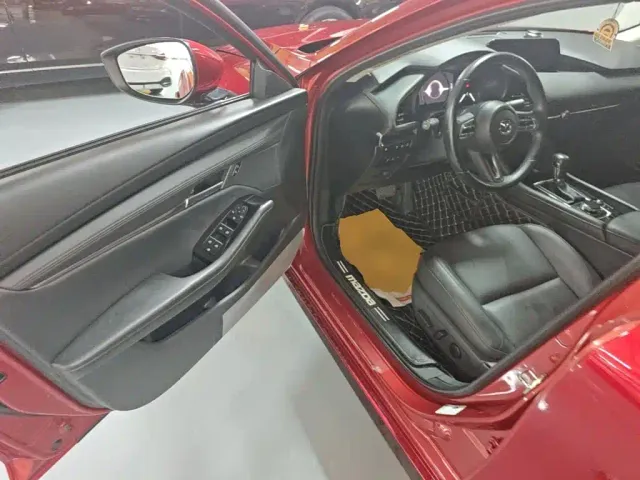 Mazda Axela — Фото автомобиля 12