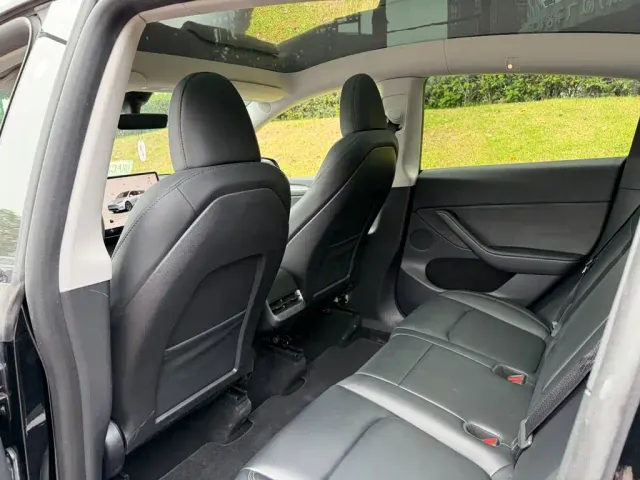 Tesla Model Y — Фото автомобиля 11