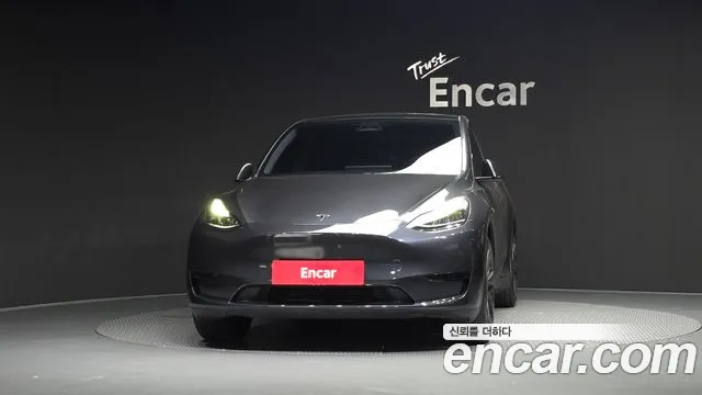 Tesla Model Y — Фото автомобиля 3