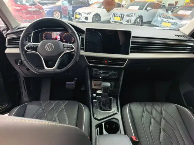 Volkswagen Tiguan L — Фото автомобиля 9