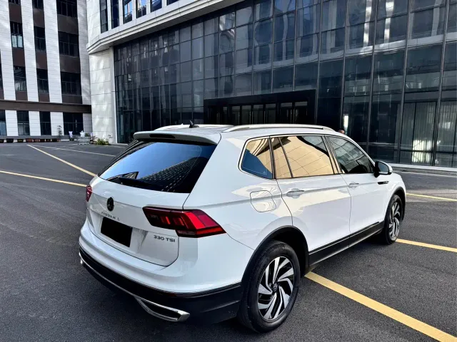 Volkswagen Tiguan L — Фото автомобиля 5