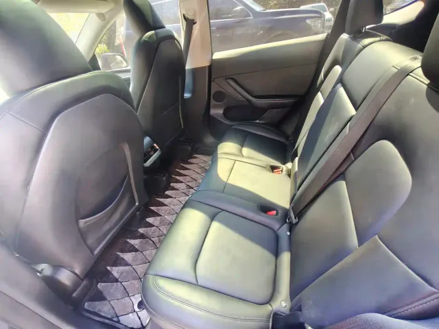 Tesla Model Y — Фото автомобиля 9