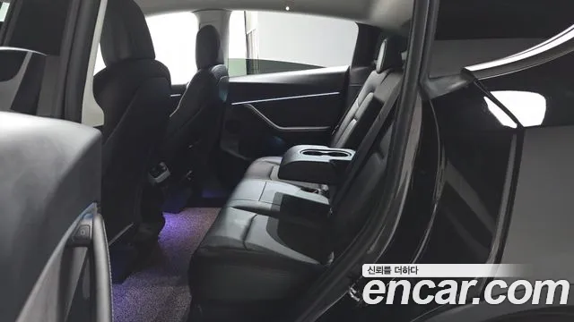 Tesla Model Y — Фото автомобиля 18