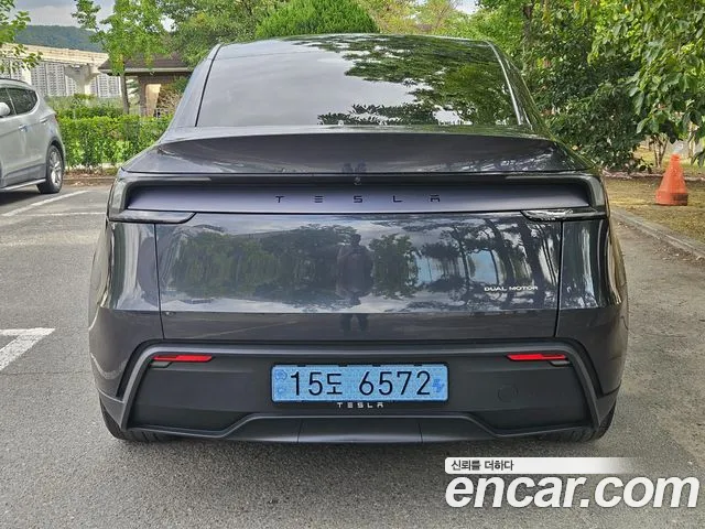 Tesla Model Y — Фото автомобиля 4