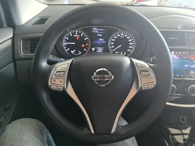 Nissan Tiida — Фото автомобиля 10