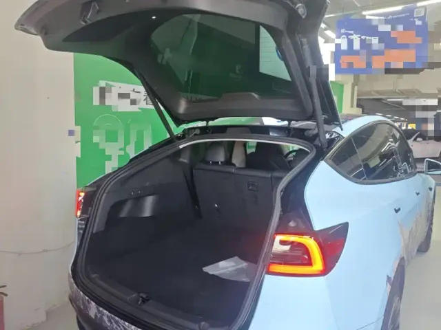 Tesla Model Y — Фото автомобиля 14