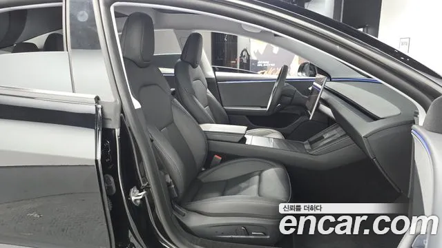 Tesla Model 3 — Фото автомобиля 11