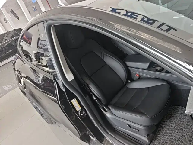 Tesla Model Y — Фото автомобиля 24