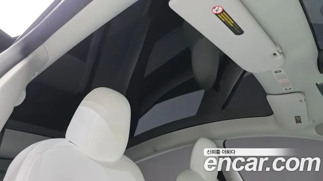 Tesla Model Y — Фото автомобиля 18