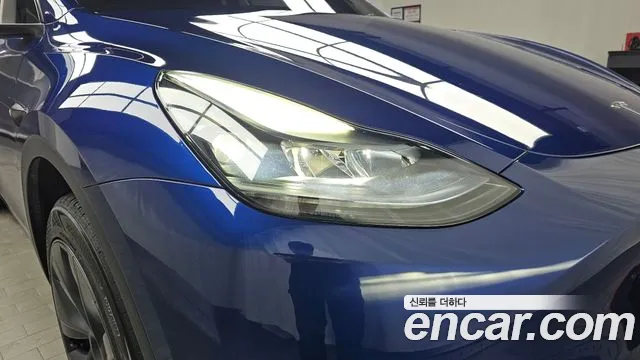 Tesla Model Y — Фото автомобиля 7