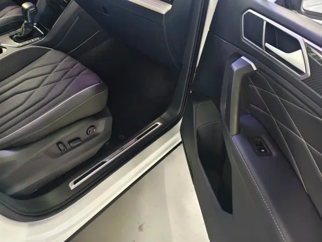 Volkswagen Tiguan L — Фото автомобиля 10