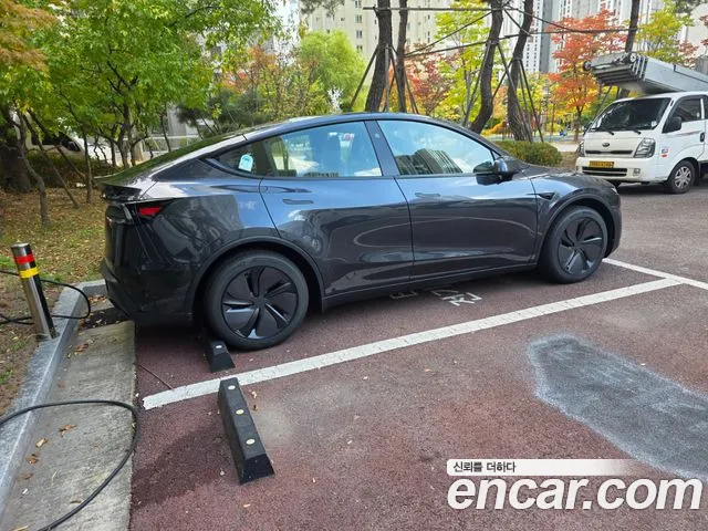 Tesla Model Y — Фото автомобиля 2