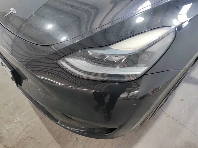 Tesla Model Y — Фото автомобиля 17
