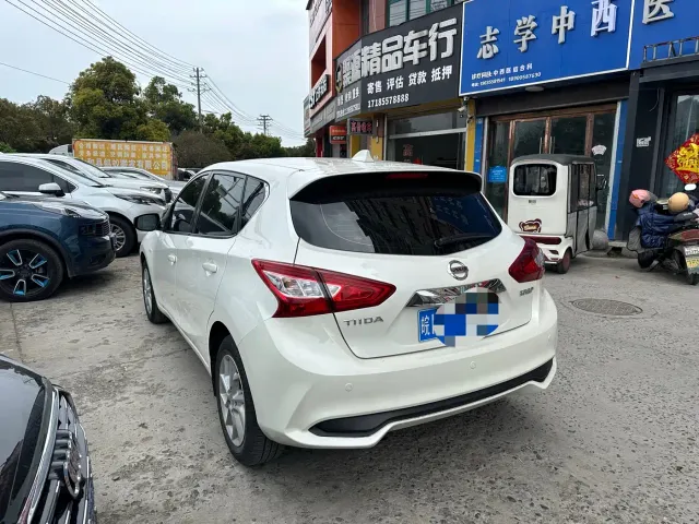 Nissan Tiida — Фото автомобиля 6