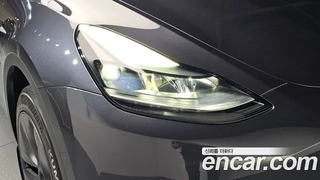 Tesla Model Y — Фото автомобиля 7