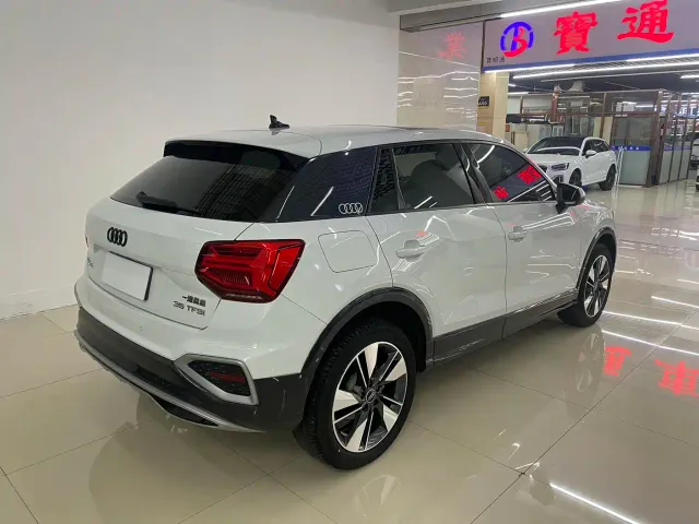 Audi Q2L — Фото автомобиля 8