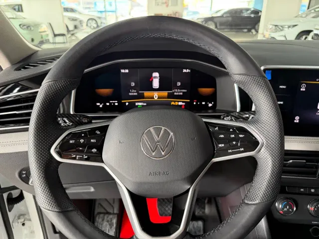 Volkswagen Tiguan L — Фото автомобиля 13