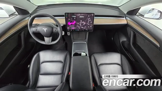 Tesla Model 3 — Фото автомобиля 7