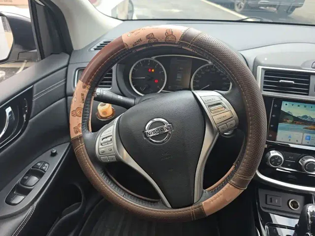 Nissan Tiida — Фото автомобиля 10