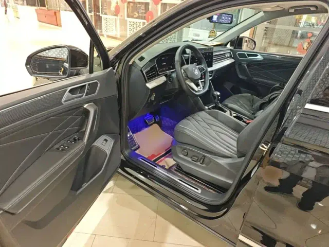 Volkswagen Tiguan L — Фото автомобиля 15