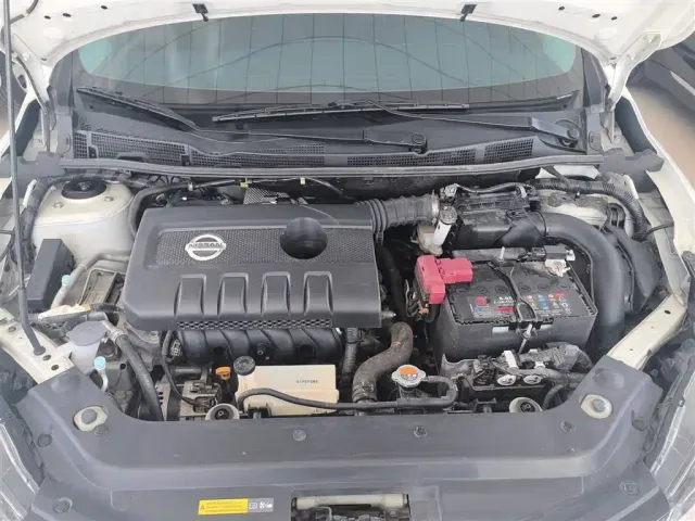 Nissan Tiida — Фото автомобиля 15