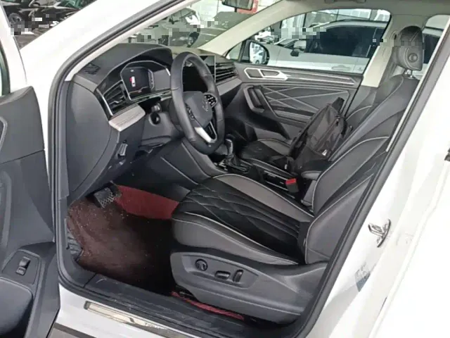Volkswagen Tiguan L — Фото автомобиля 15