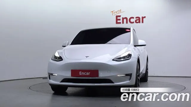 Tesla Model Y — Фото автомобиля 3