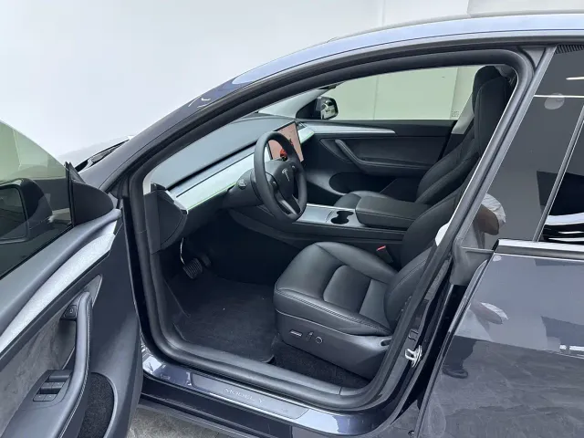 Tesla Model Y — Фото автомобиля 16