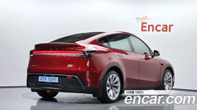 Tesla Model Y — Фото автомобиля 2