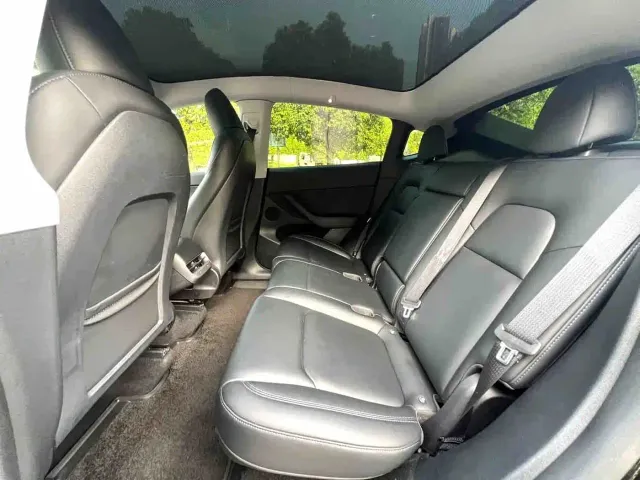 Tesla Model Y — Фото автомобиля 9