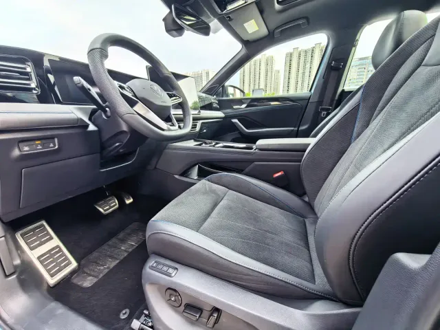 Volkswagen Tiguan L — Фото автомобиля 11
