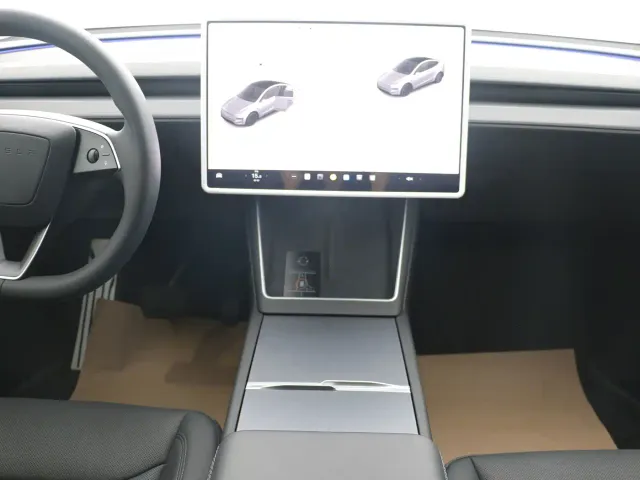 Tesla Model Y — Фото автомобиля 14