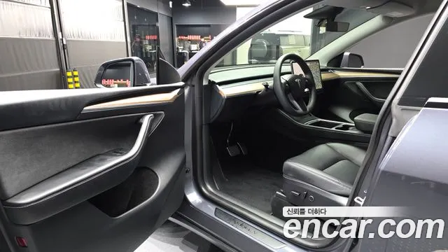 Tesla Model Y — Фото автомобиля 4