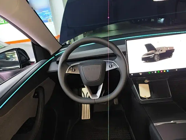 Tesla Model Y — Фото автомобиля 10