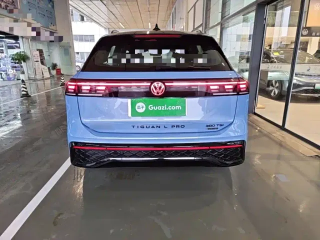 Volkswagen Tiguan L — Фото автомобиля 5
