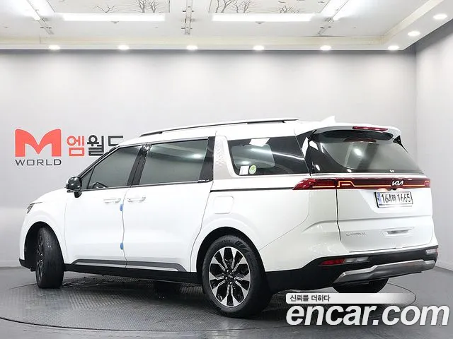 Kia Carnival Generation 4 — Фото автомобиля 4