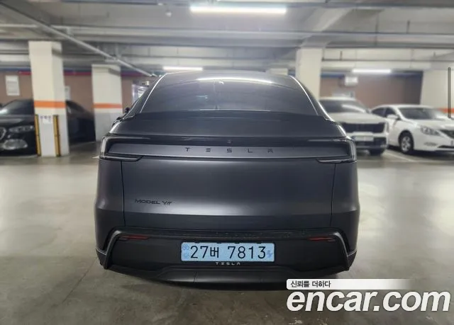 Tesla Model Y — Фото автомобиля 2