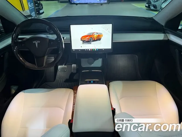 Tesla Model Y — Фото автомобиля 7
