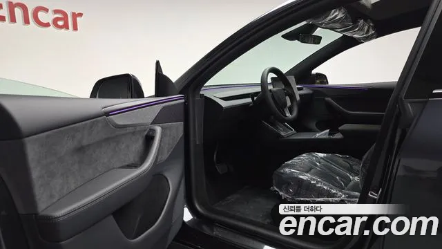 Tesla Model Y — Фото автомобиля 3