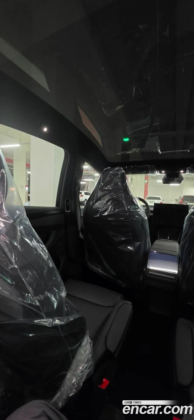 Tesla Model Y — Фото автомобиля 15