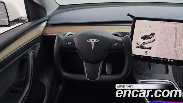 Tesla Model Y — Фото автомобиля 19
