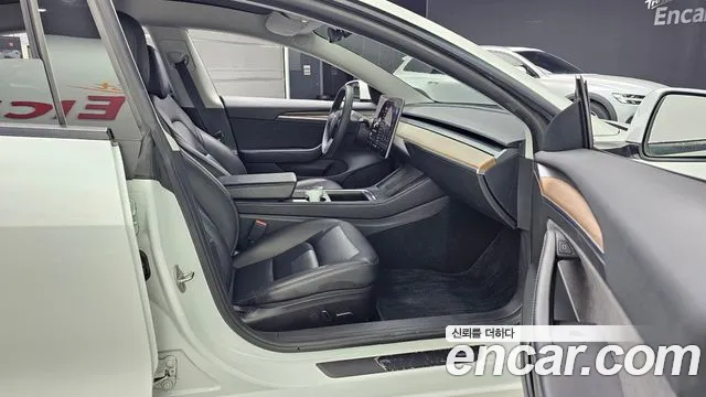 Tesla Model 3 — Фото автомобиля 25