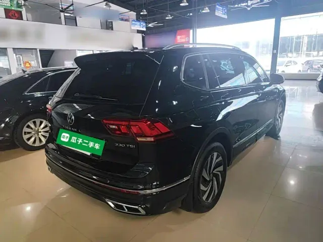 Volkswagen Tiguan L — Фото автомобиля 6