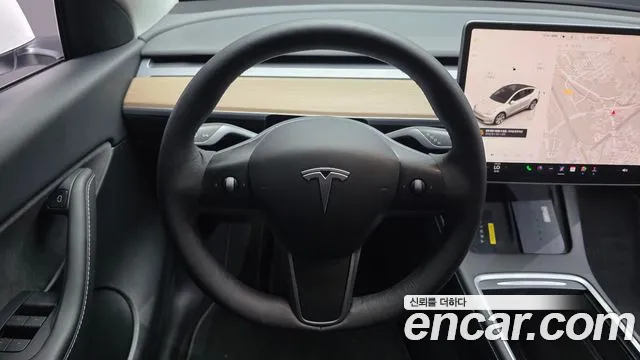 Tesla Model Y — Фото автомобиля 13