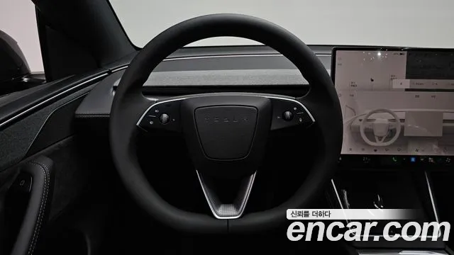 Tesla Model Y — Фото автомобиля 12