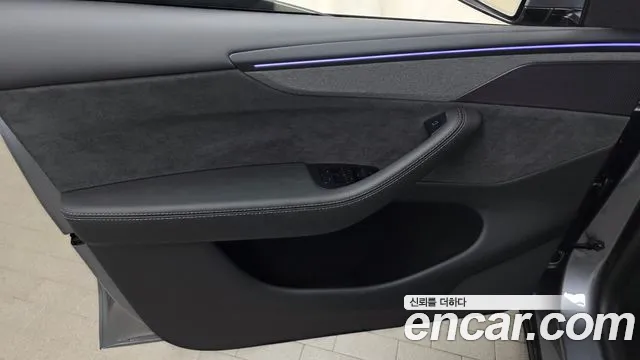 Tesla Model Y — Фото автомобиля 23