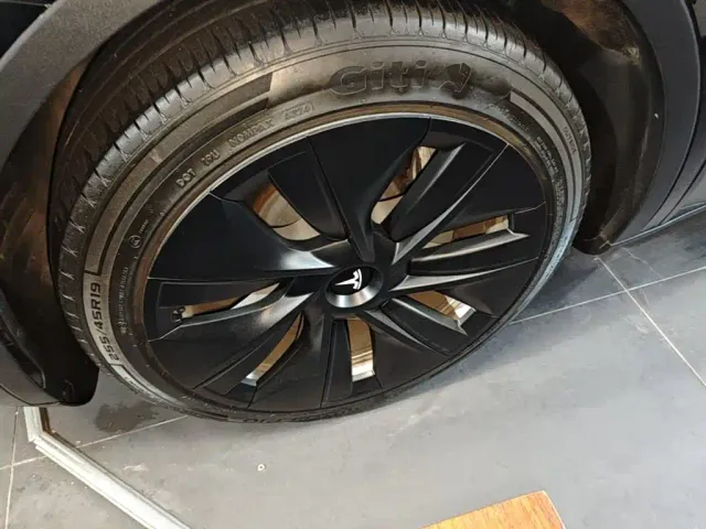 Tesla Model Y — Фото автомобиля 22